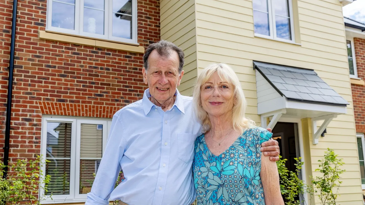The Bagleys outside their Woodlands home