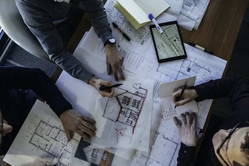 over head of architect drawings