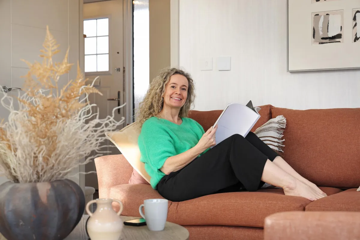 lady on couch reading